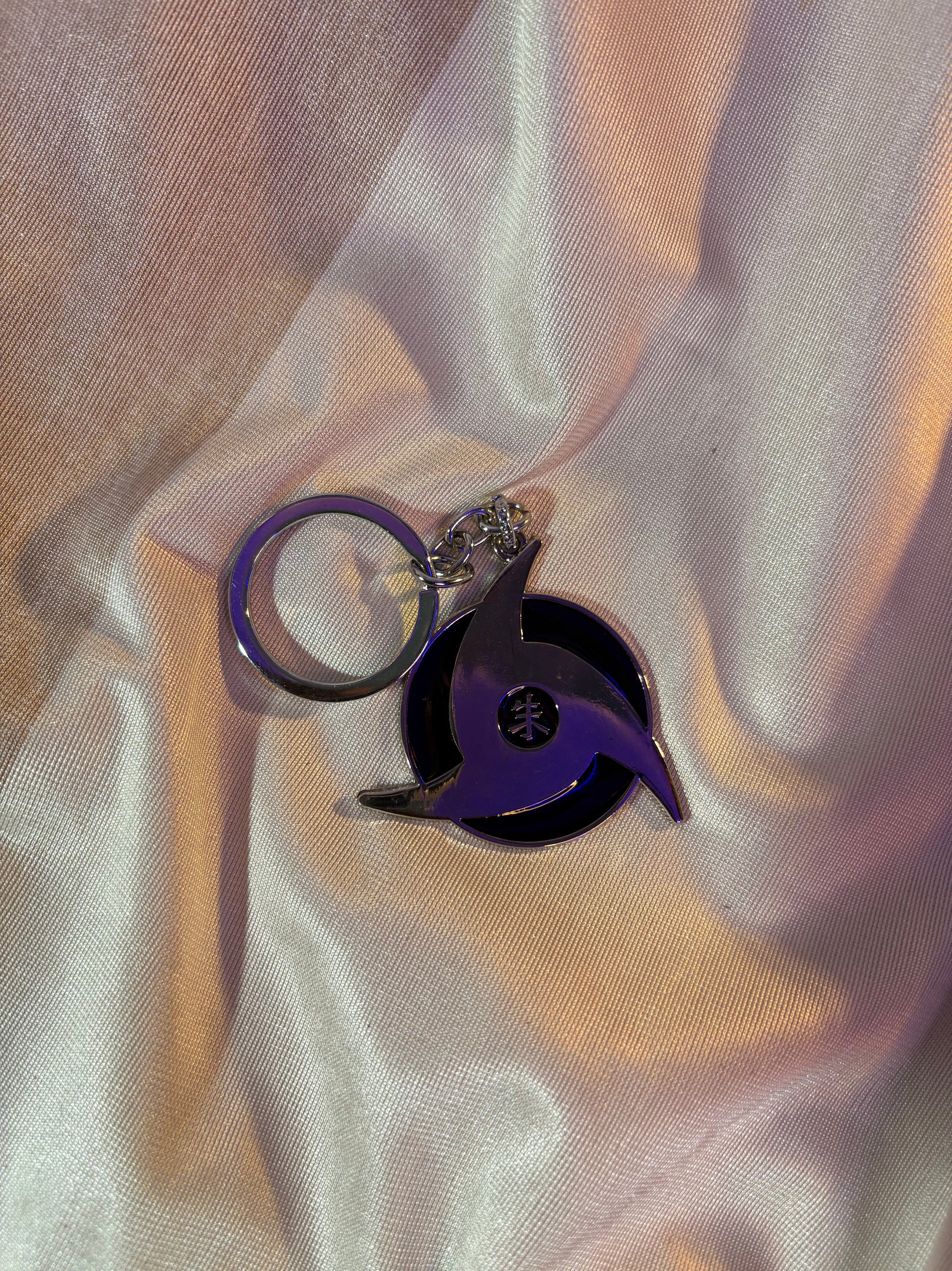 MANGEKYO SHARINGAN METALLIC KEYCHAIN